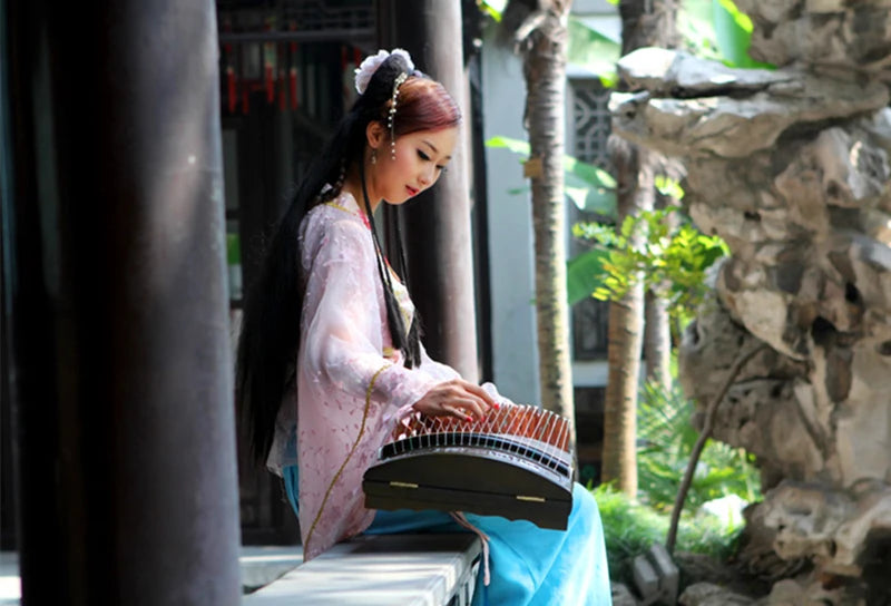 China Guzheng Professional Embossed Solid Wood Zither The Master Signature Guzheng First Grade Platane Wood String Instruments