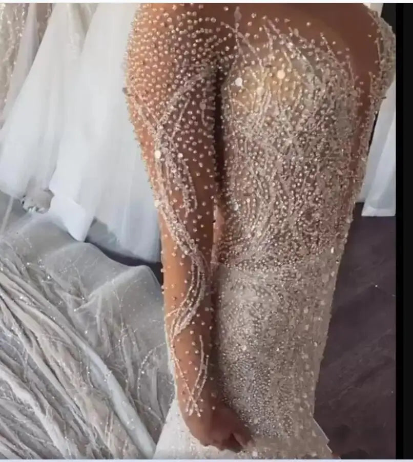 Full Heavy Crystal Beaded Mermaid Wedding Dresses Luxury See Through Long Sleeves African Plus Size Buttons Back Bridal Gown