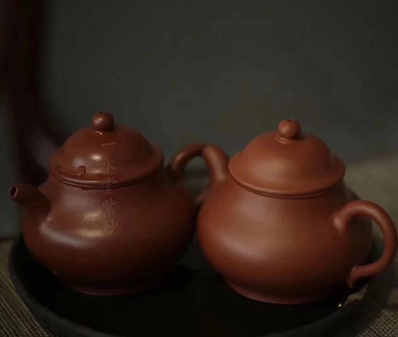 Yishuitang Yixing raw ore pure handmade purple clay pot family small coal mine vermilion clay pot bag 24K gold 180ml