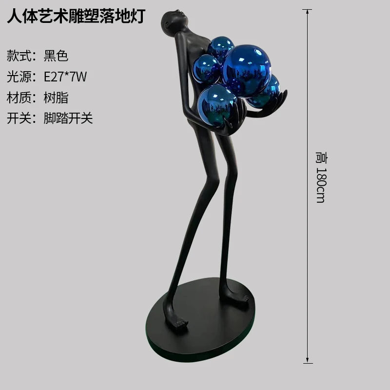Nordic humanoid sculpture floor lamp creative ball holding designer exhibition hall, hotel sales office, character decoration st
