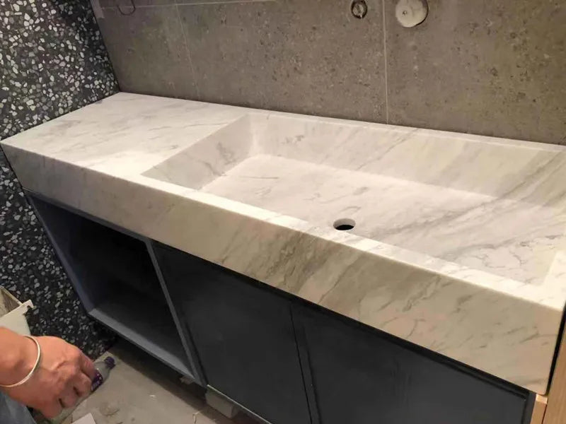 ANTNX Customizable light luxury natural marble basin integrated wash basin bathroom simple wall-mounted transparent wash basin ANTNX.COM