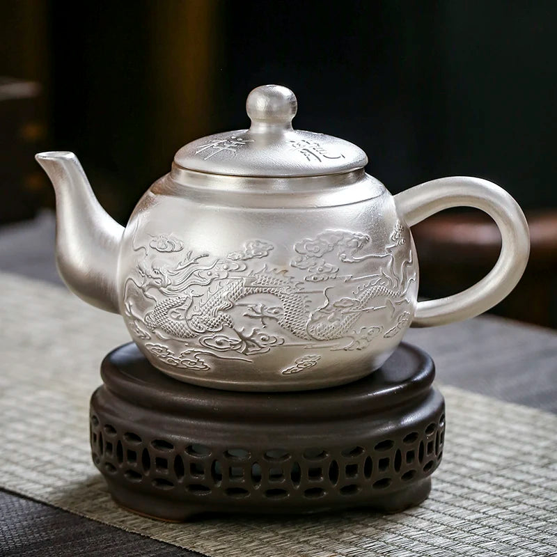 |high-grade teapot 999 sterling silver hand relief fine silver side longfeng xi shi the household single pot pot of tea
