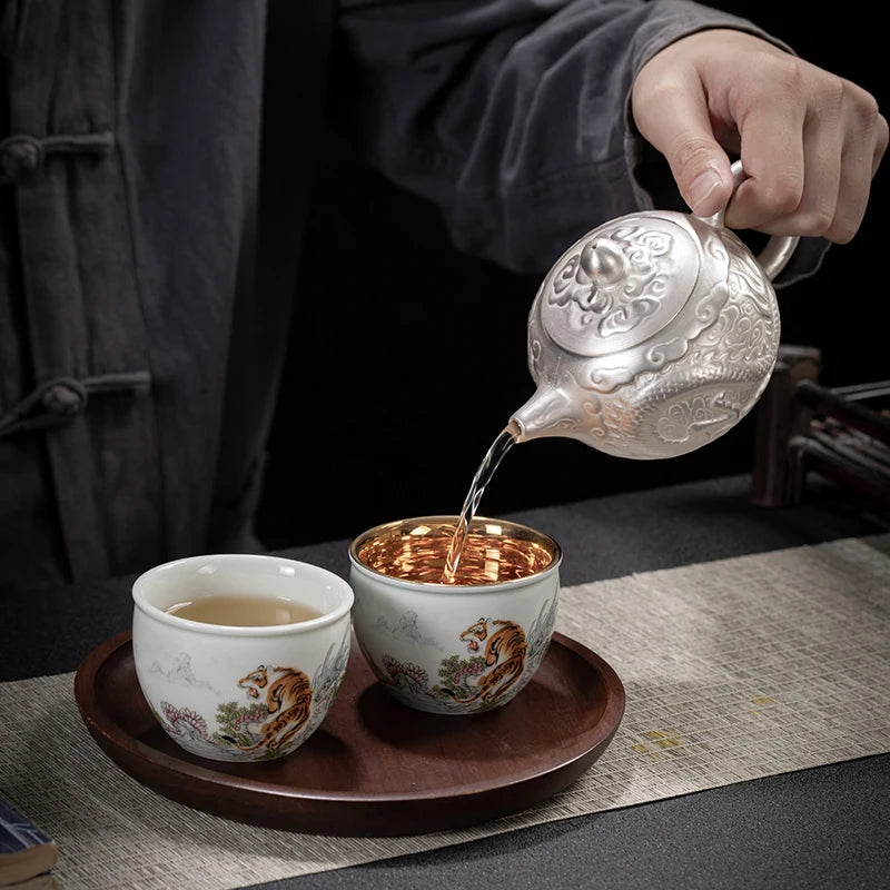 |high-grade teapot 999 sterling silver hand relief fine silver side longfeng xi shi the household single pot pot of tea