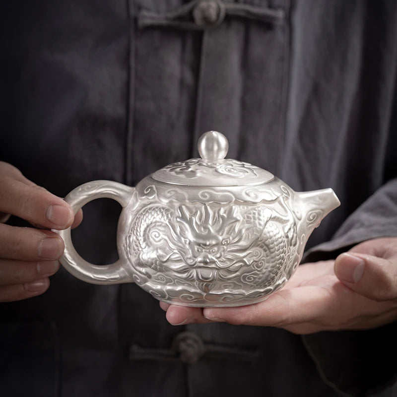 |high-grade teapot 999 sterling silver hand relief fine silver side longfeng xi shi the household single pot pot of tea