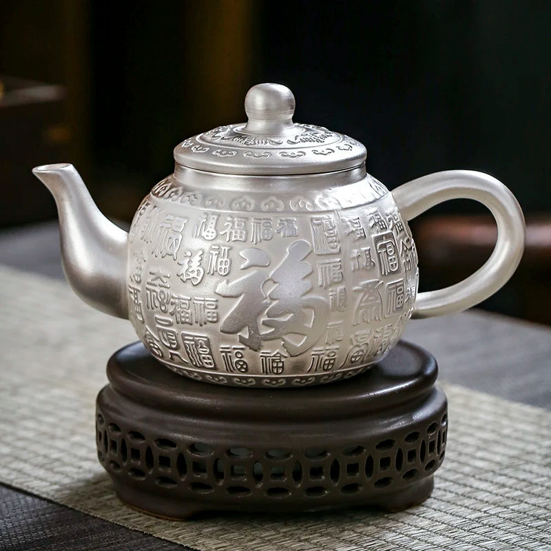 |high-grade teapot 999 sterling silver hand relief fine silver side longfeng xi shi the household single pot pot of tea