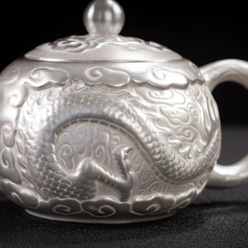|high-grade teapot 999 sterling silver hand relief fine silver side longfeng xi shi the household single pot pot of tea