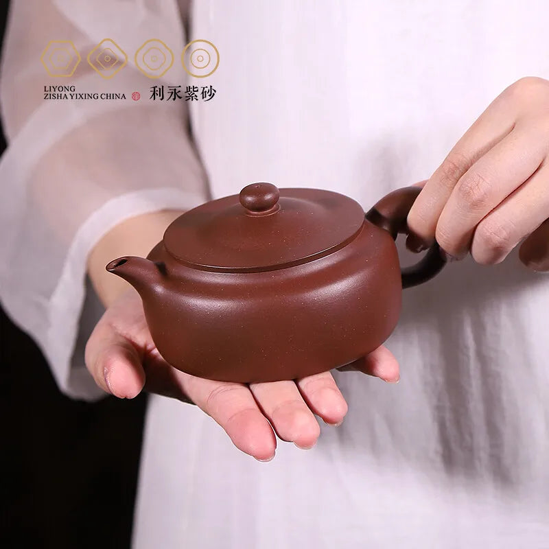 Centennial Liyong Yixing Famous Fan Caiqin Pure Handmade Purple Clay Pot Raw Ore Bottom Trough Clear Flat Tea Pot Kung Fu Tea Se