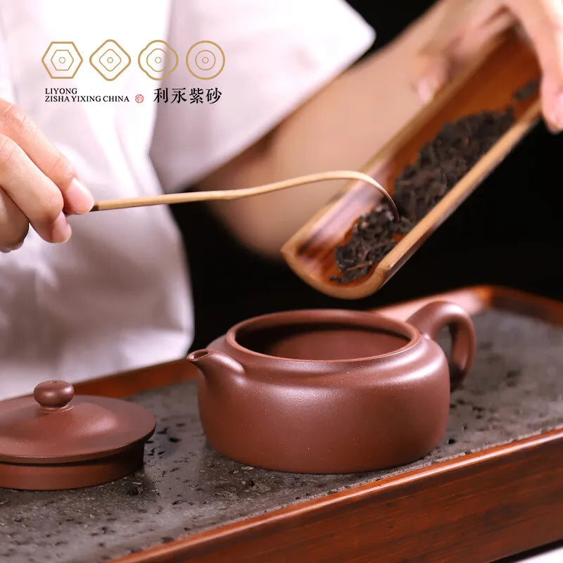 Centennial Liyong Yixing Famous Fan Caiqin Pure Handmade Purple Clay Pot Raw Ore Bottom Trough Clear Flat Tea Pot Kung Fu Tea Se