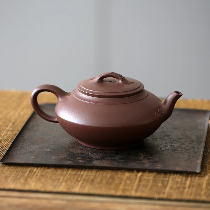 Monohydrate hall yixing undressed ore pure manual recommended lingyun purple clay pot of 320 ml flexibly moire figure