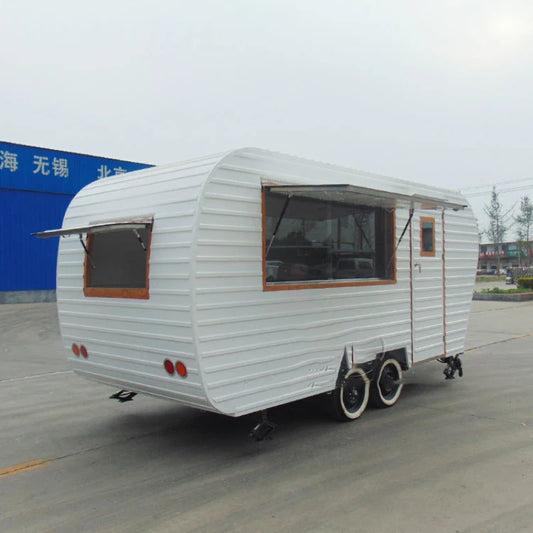 Outdoor commercial street shops with VIN coffee caravans and fast food trucks