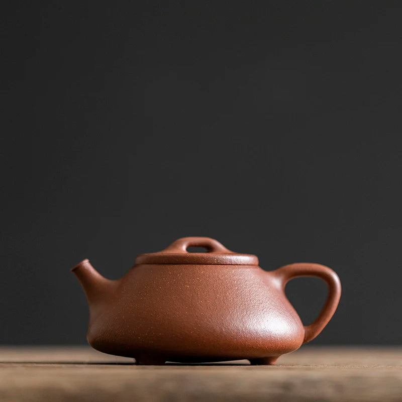 So Shi Li] Yixing mine pure handmade purple sand pot ml Chinese retro wind downhill mud boat stone ladle purple sand pot