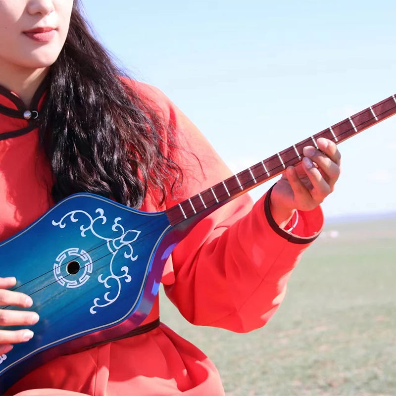 Tovshuur Mongolian plucked musical instrument