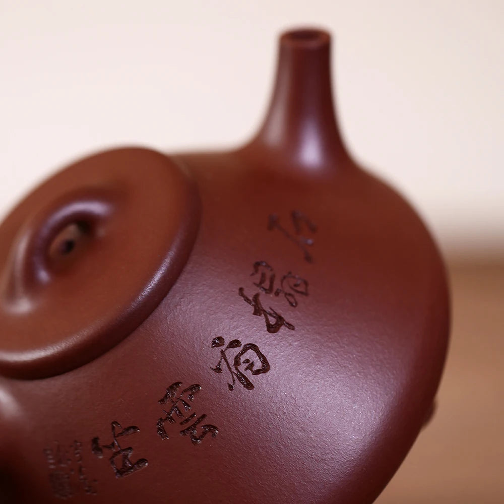 |high-end yixing recommended famous son Pan Tao pure manual stone gourd ladle pot of smelting ore bottom groove 250 c
